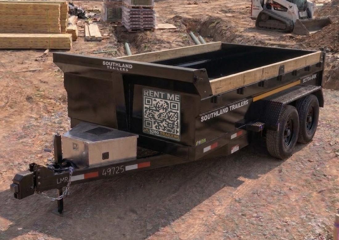 7x14 tandem-axle hydraulic dump trailer with roller tarp — Denver dump trailer rental